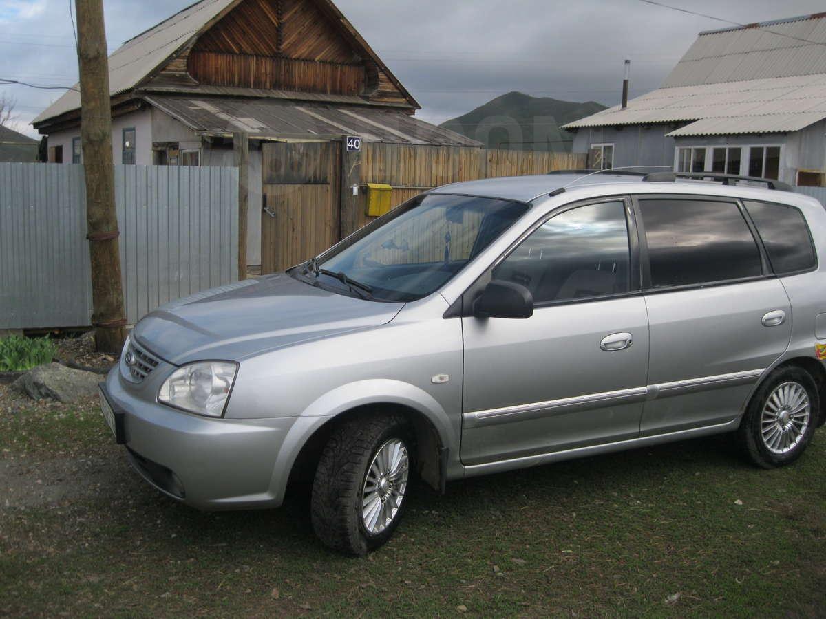 kia carens 2003 года фото