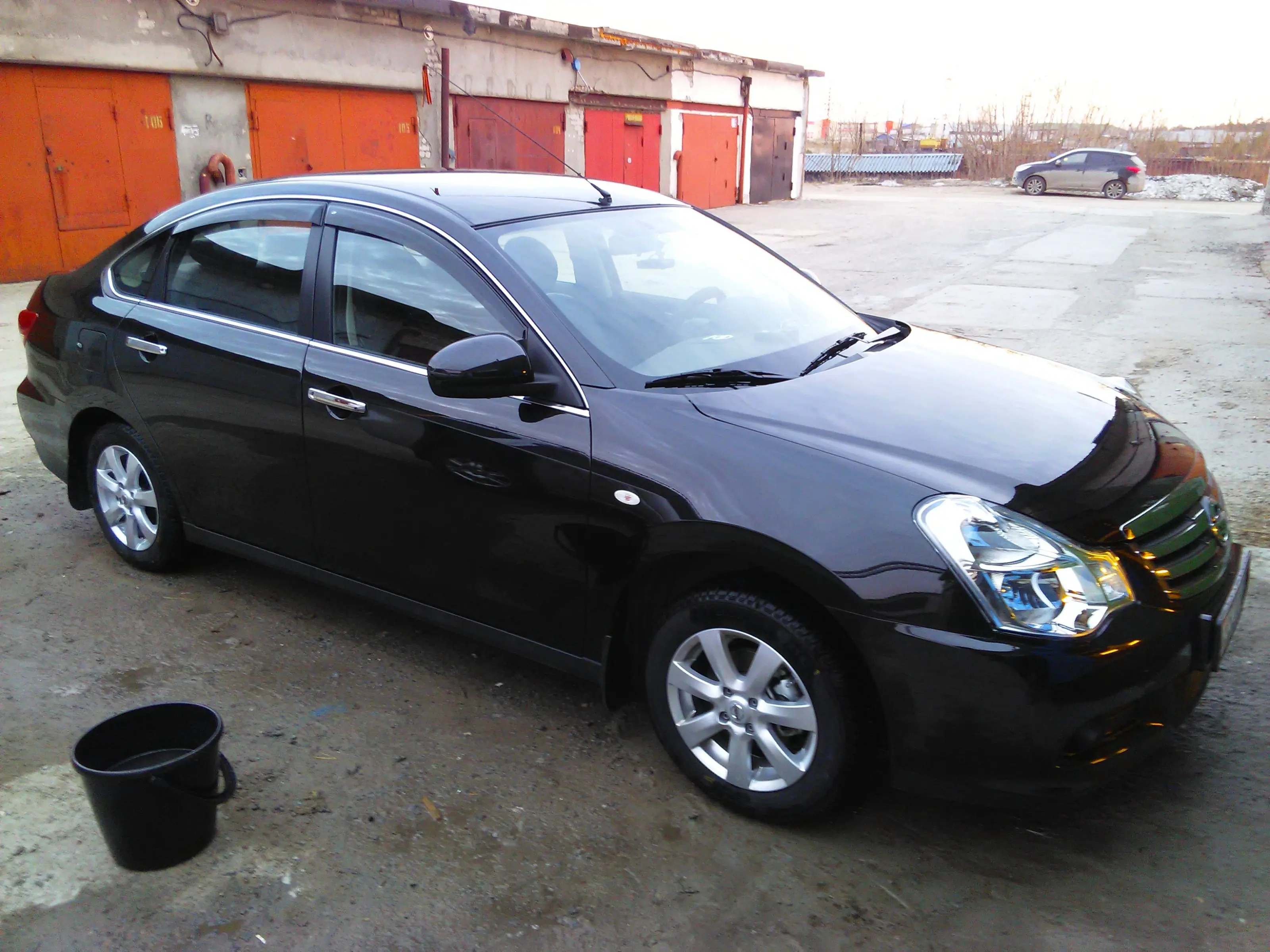 подробное описание машины nissan almera 2014 отзывы