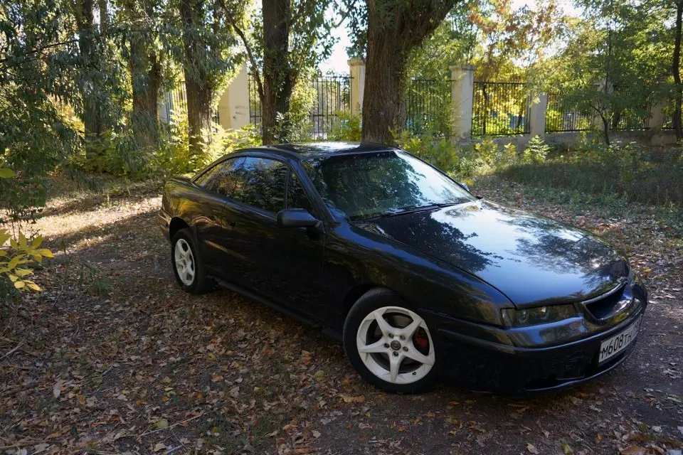 Хонда 95 год. Opel Calibra 1995. Опель калибра 95. Опель калибра 95 года. Opel Calibra 1995 2xe.