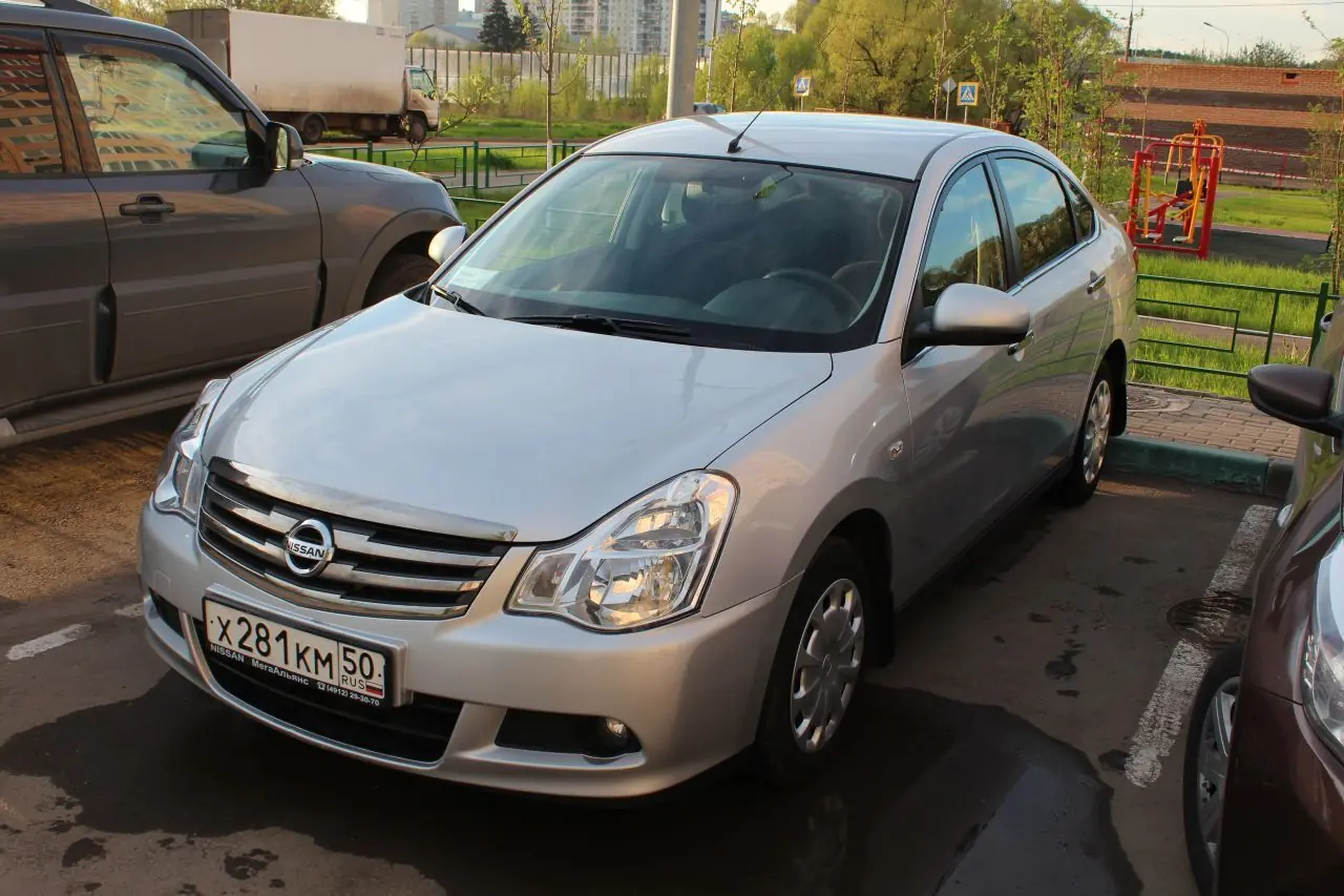 подробное описание машины nissan almera 2014 отзывы