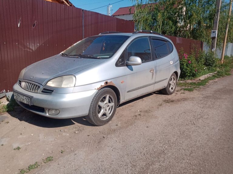 Дэу Такума 2001