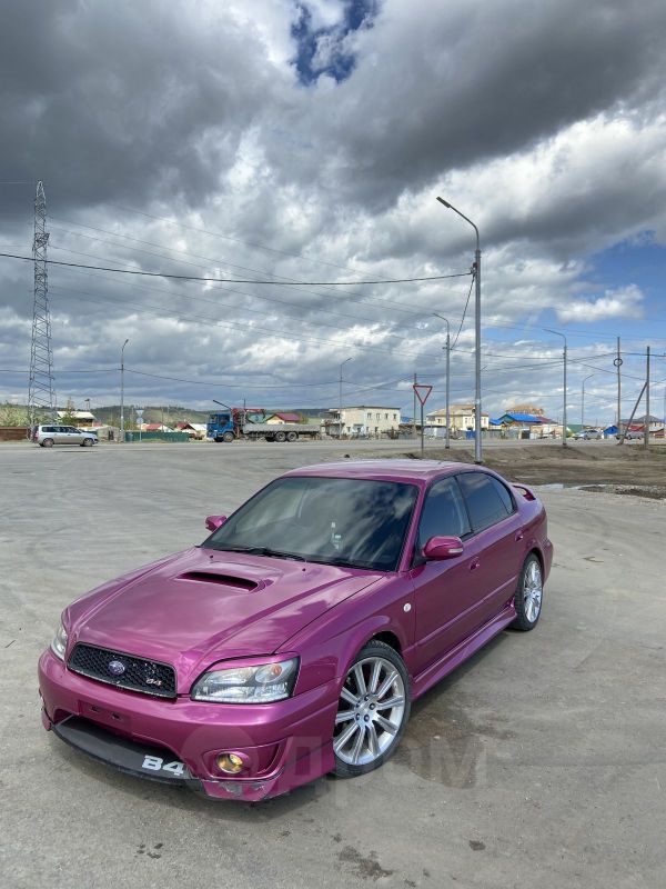 Розовая Subaru Legacy
