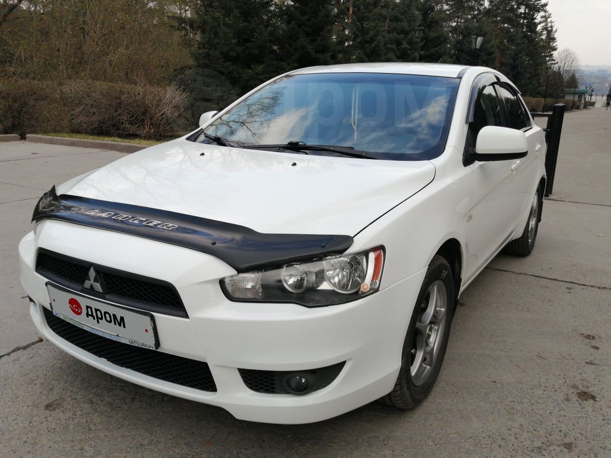 Lancer 2007 белый