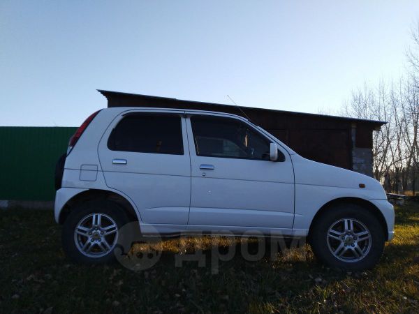 Дайхатсу Териос 2003