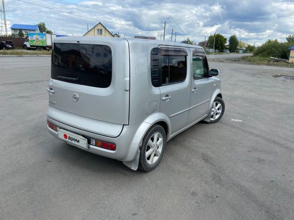 Ниссан куб 2003