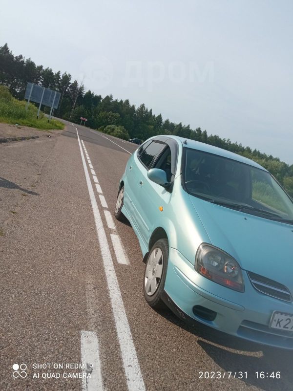 Ниссан Тино синий 2000