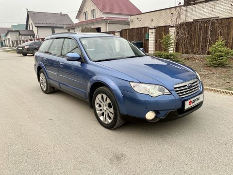 Голубой Субару Аутбек 2007