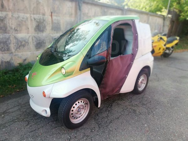 Тойота Комс электромобиль